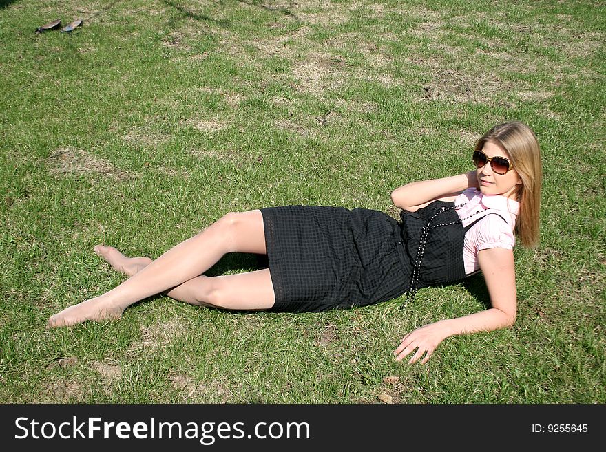 Girl resting in a park. Girl resting in a park