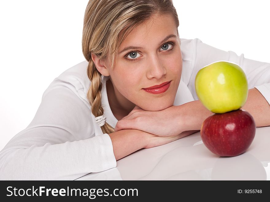 Portrait of woman with two apples on white background. Portrait of woman with two apples on white background