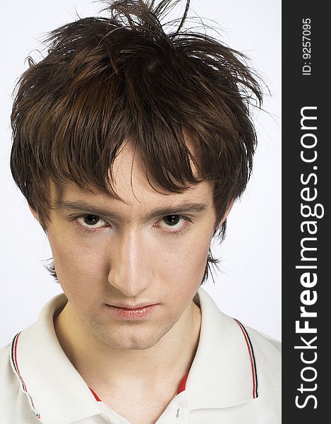 Portrait of young man in white shirt. Portrait of young man in white shirt