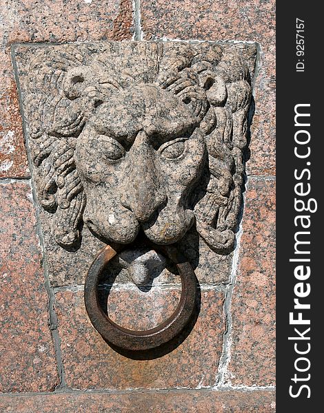 Lion head on Neva embankment in Saint-Petersburgh, Russia