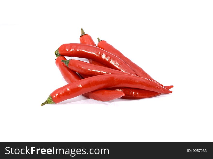 Red peppers of the white background