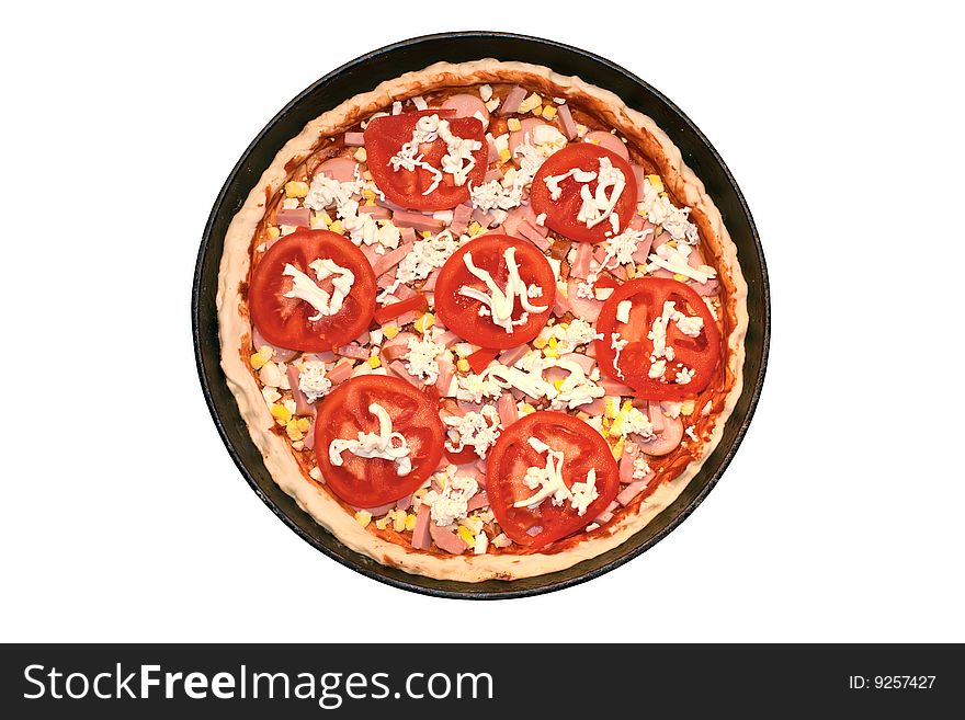 Not cooked pizza on the white background