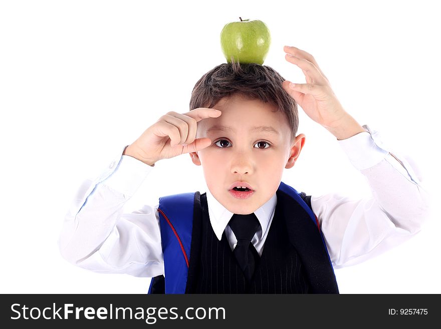 Schoolboy with backpack and apple
