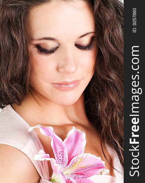 Portrait of a beautiful woman with flower in pink. Portrait of a beautiful woman with flower in pink