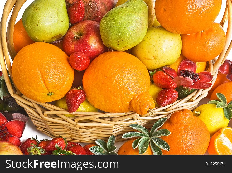 background with   orange,apple,strawberry and pear in backet. background with   orange,apple,strawberry and pear in backet