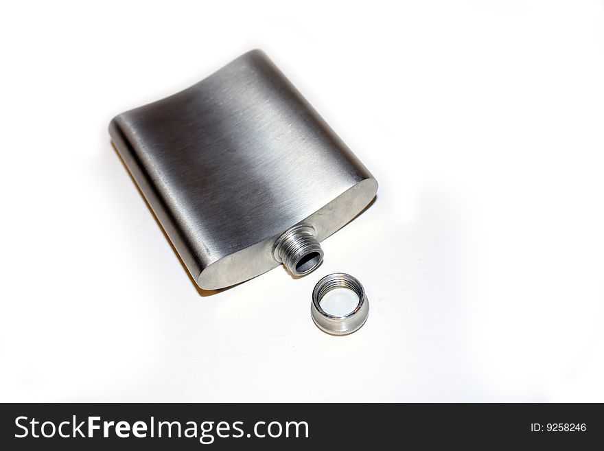 Silver whiskey flask on white background.