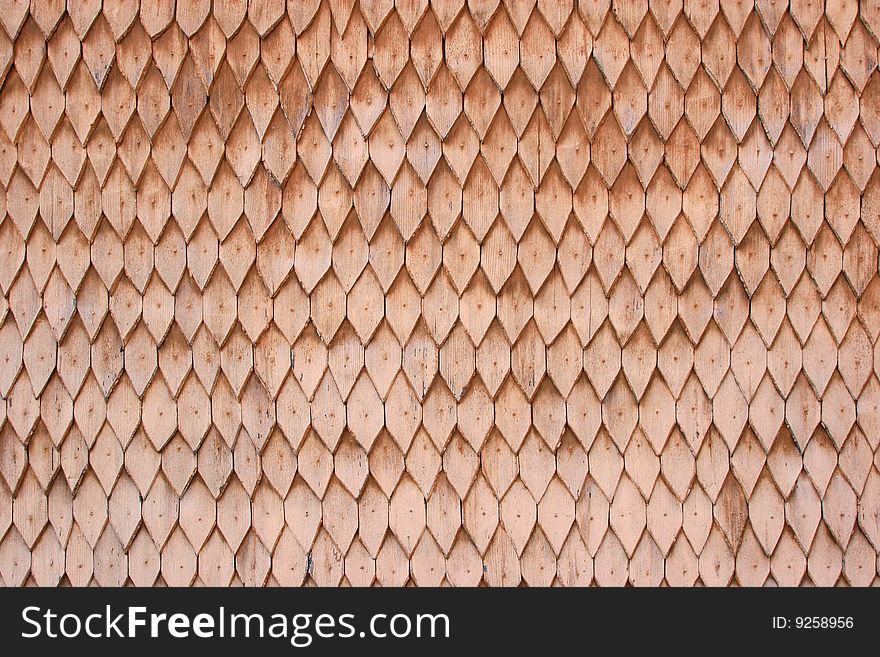 A stock photo of an old roof of a house made of wooden tiles. A stock photo of an old roof of a house made of wooden tiles