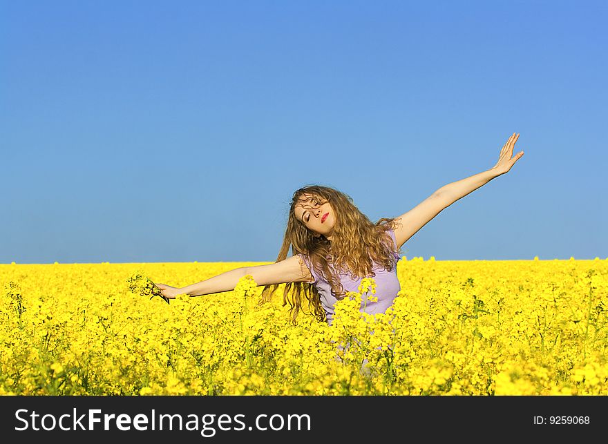 Woman in rape(canola) field. Woman in rape(canola) field