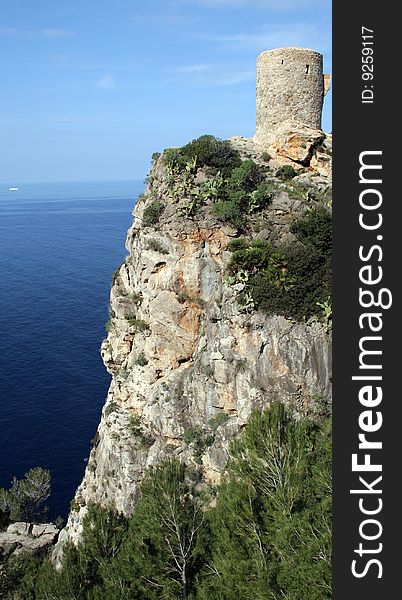 Tower for observation on the edge above the Mediterranean sea