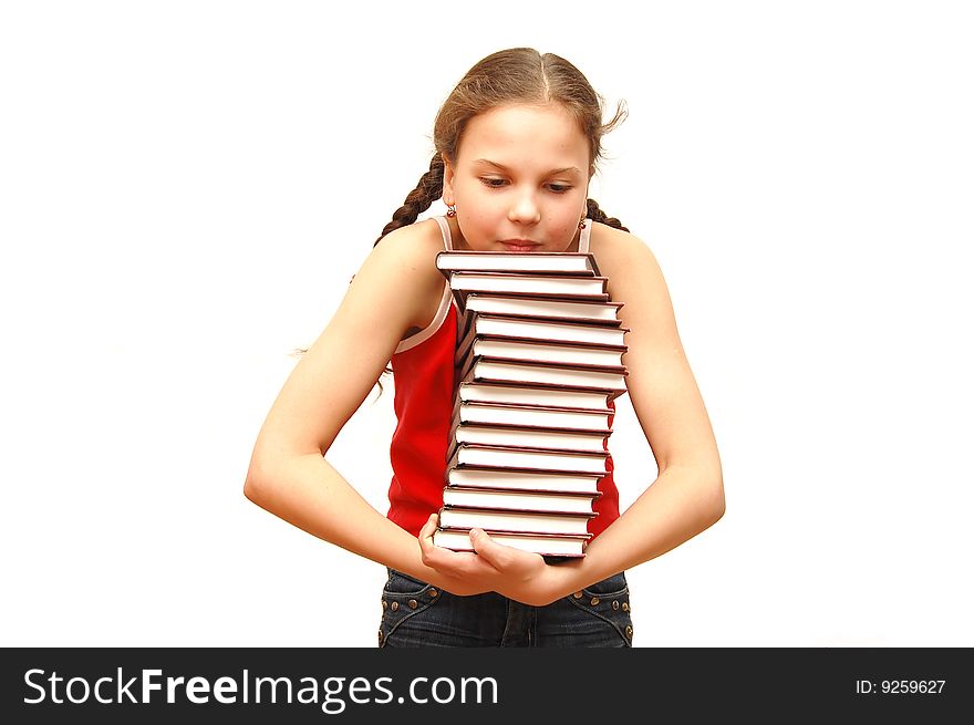 Teenage girl with stack of books