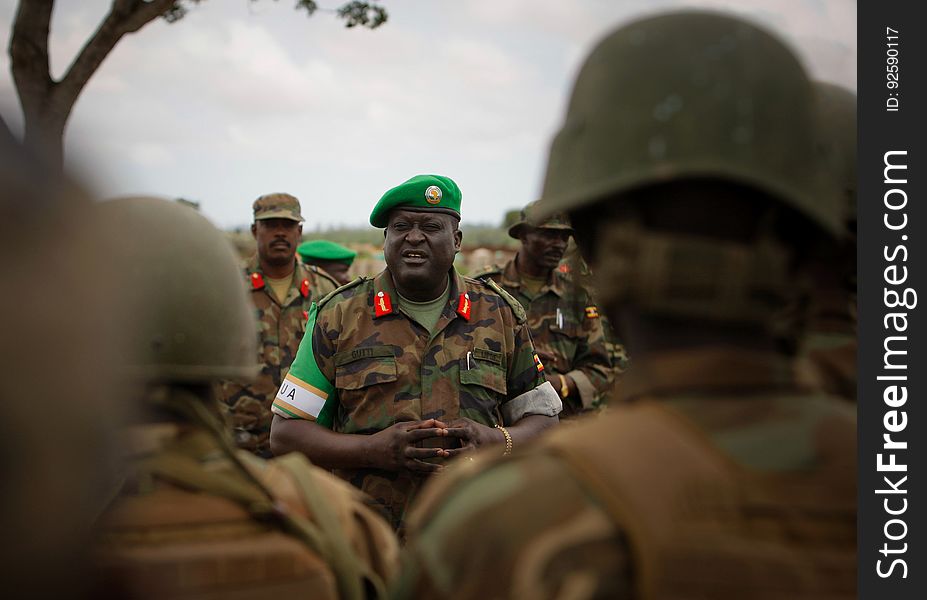 African Union Mission in Somalia &#x28;AMISOM&#x29; Force Commander Lt. Gen. Andrew Gutti addresses Ugandan soldiers serving with the AU operation 5 June in Afgoye located 30km to the west of the Somali capital Mogadishu. AMISOM supporting Somali National Army &#x28;SNA&#x29; forces recently liberated the Afgoye Corridor from the Al Qaeda-affiliated extremist group Al Shabaab, pushing them further away from Mogadishu and opening up the free flow of goods and produce between the fertile agricultural area surrounding Afgoye and the Somali capital. AU-UN IST PHOTO / STUART PRICE. African Union Mission in Somalia &#x28;AMISOM&#x29; Force Commander Lt. Gen. Andrew Gutti addresses Ugandan soldiers serving with the AU operation 5 June in Afgoye located 30km to the west of the Somali capital Mogadishu. AMISOM supporting Somali National Army &#x28;SNA&#x29; forces recently liberated the Afgoye Corridor from the Al Qaeda-affiliated extremist group Al Shabaab, pushing them further away from Mogadishu and opening up the free flow of goods and produce between the fertile agricultural area surrounding Afgoye and the Somali capital. AU-UN IST PHOTO / STUART PRICE.