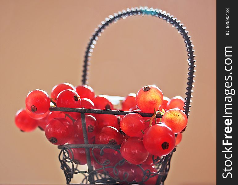 Red Cherries on Silver Metal Basket Photo