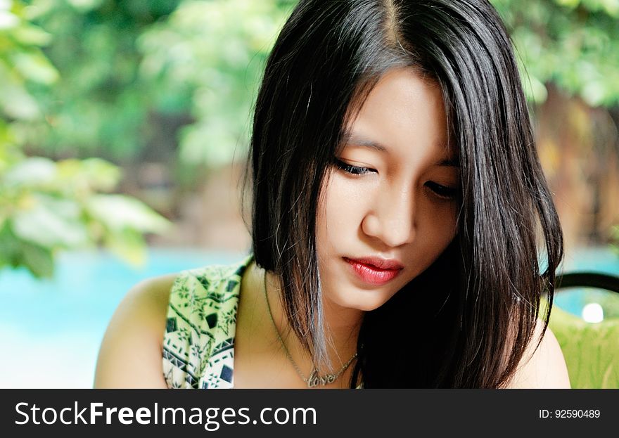 Portrait of a young Asian woman.