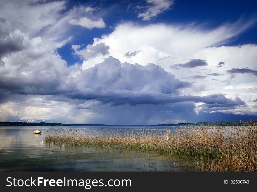 A calm lake before a storm hits.