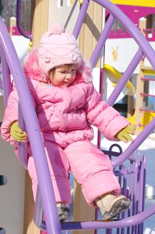 Baby Have A Good Time On Attraction In Park Royalty Free Stock Photography Baby Have A Good Time On Attraction In Park Royalty Free Stock Photography
