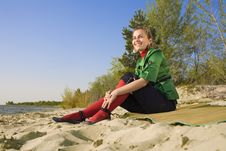 Girl Sitting On Sea Coast Stock Images Girl Sitting On Sea Coast Stock Images