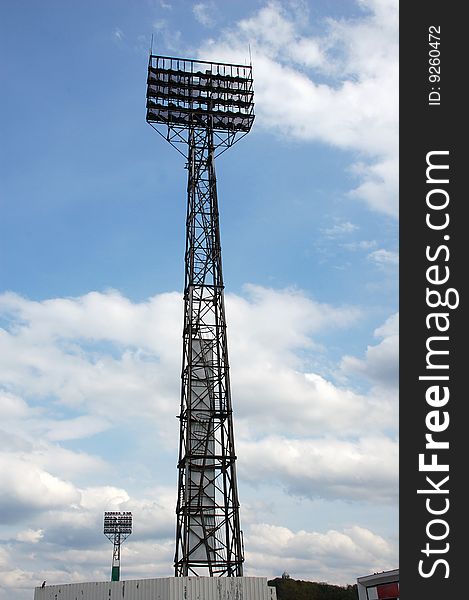 Two stadiums spotlight. Illuminate nighttime football field (Spartak-Nalchik from Russia, Kabardino-Balkaria). Two stadiums spotlight. Illuminate nighttime football field (Spartak-Nalchik from Russia, Kabardino-Balkaria)