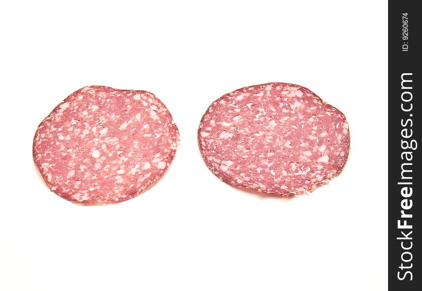 Slices of salami 
photography studio with white background