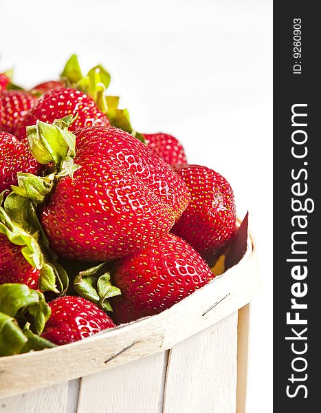 Basket full of ripe and delicious strawberries