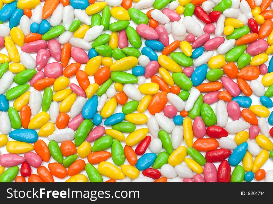 Disposit of the sweetmeats in colour glaze on white background