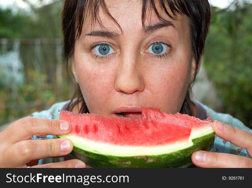 Natural looking woman with watermelon
