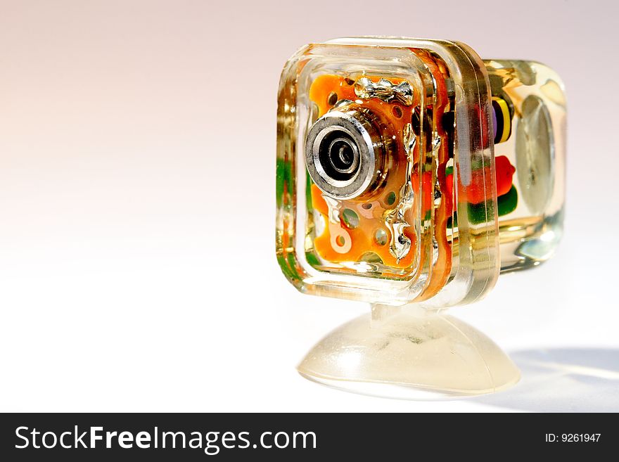 A close up photo of a small electronic device that allows off camera flash to be fired with the main flash. A close up photo of a small electronic device that allows off camera flash to be fired with the main flash