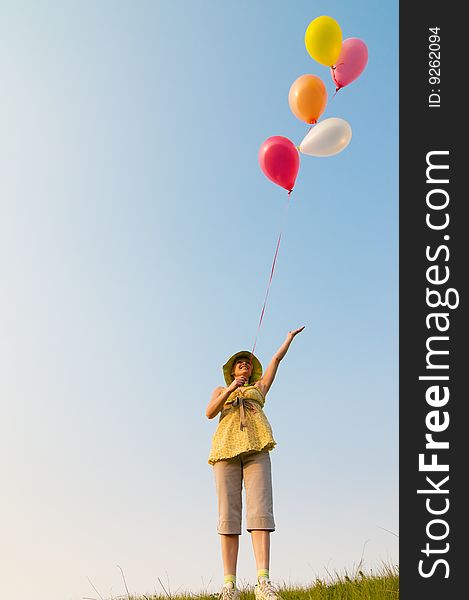 Girl with balloons