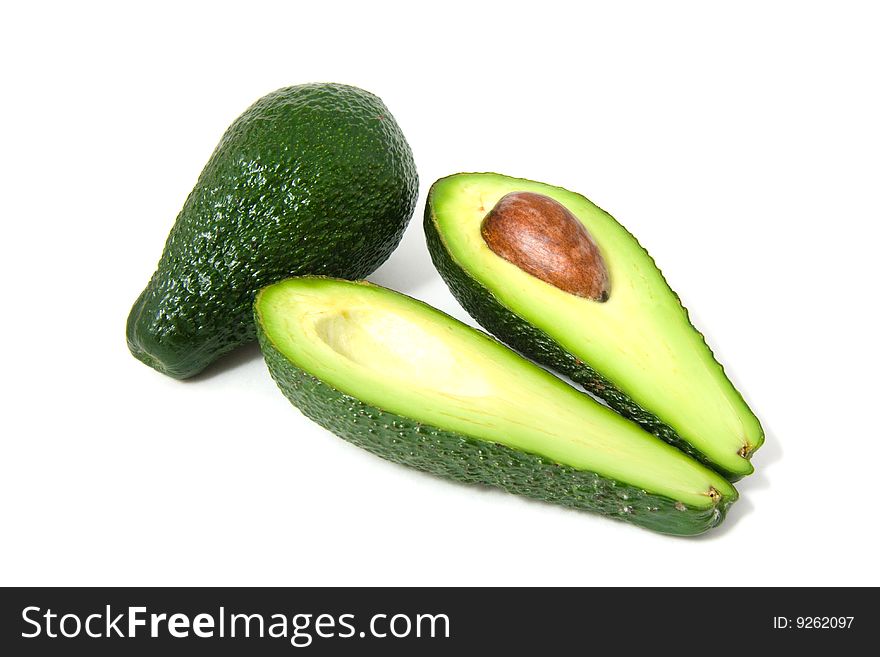 Fresh avocados isolated on white background