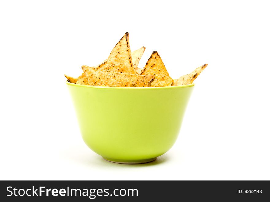 Tortilla chips in green bowl.