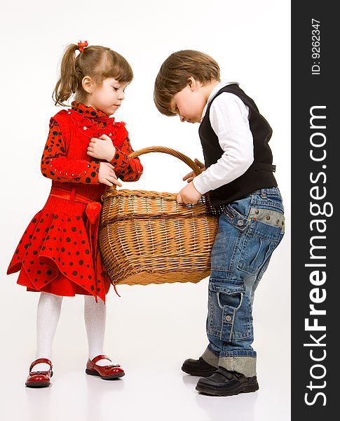 Two beautiful children with basket