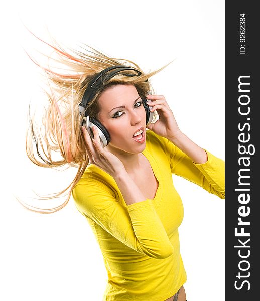 Beautiful blond girl with long hair and headphones. Beautiful blond girl with long hair and headphones