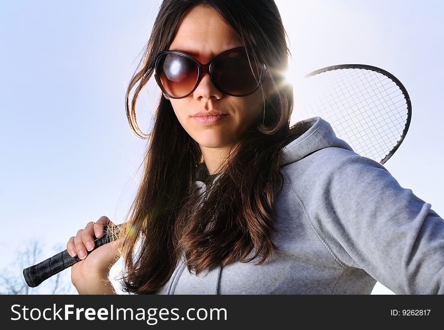 Young Woman With Badminton Racquet