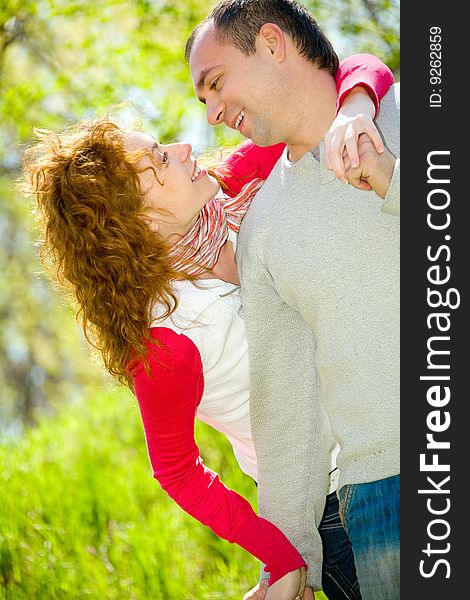 Happy young couple with outdoor portrait. Happy young couple with outdoor portrait