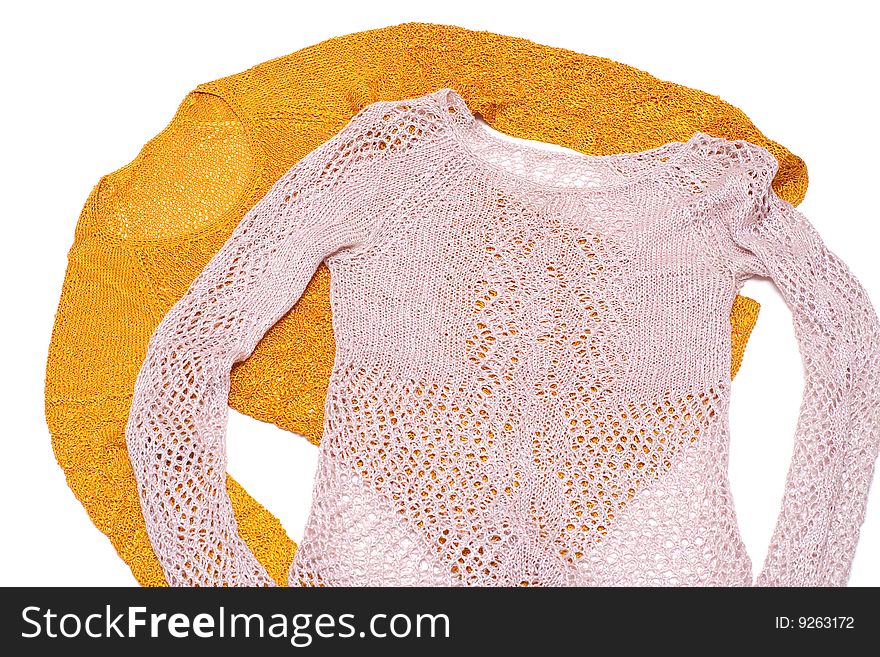 Two knitted blouses isolated over white