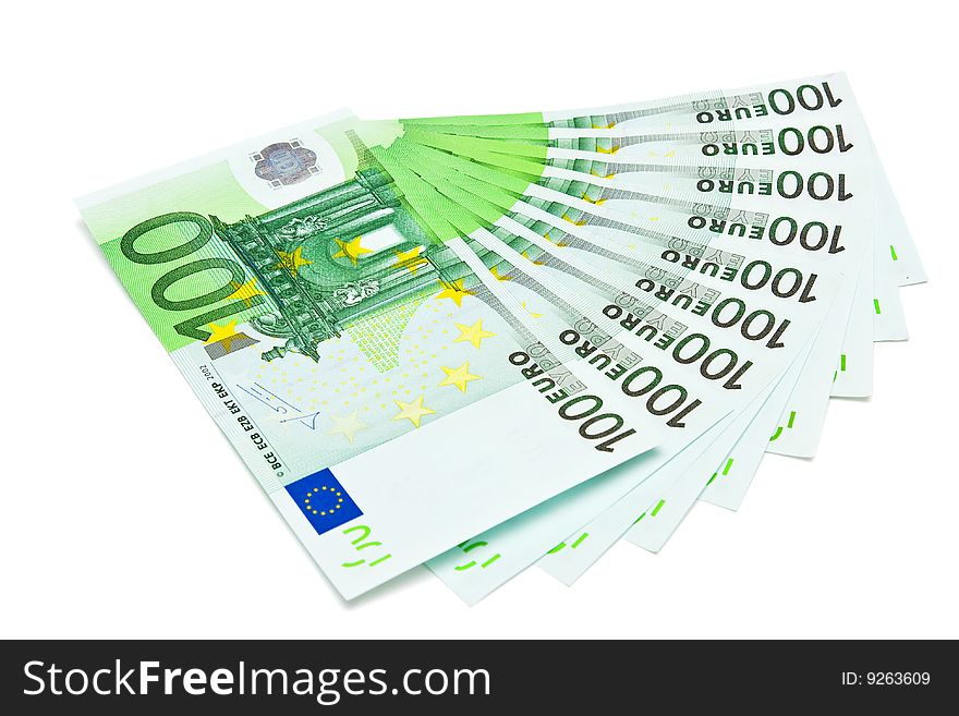 Several one hundred euro bank notes isolated on white