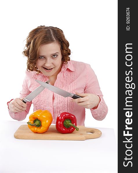 Woman wants to eat sweet peppers. Beautiful young girl with fresh vegetables.  Woman with sweet peppers. Isolated over white background. Woman wants to eat sweet peppers. Beautiful young girl with fresh vegetables.  Woman with sweet peppers. Isolated over white background.