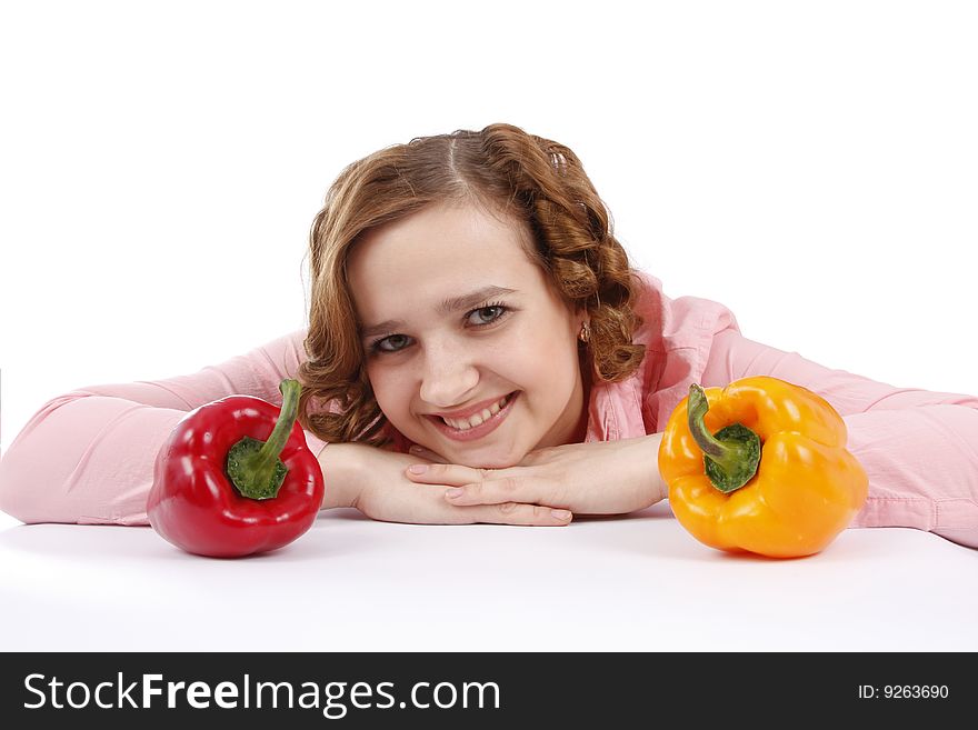 Woman wants to eat sweet peppers. Housewife with sweet peppers. Girl wants to eat sweet peppers.  Isolated over white background. Woman wants to eat sweet peppers. Housewife with sweet peppers. Girl wants to eat sweet peppers.  Isolated over white background.