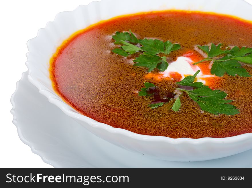 Close-up soup from beet with sour cream, isolated on white. Close-up soup from beet with sour cream, isolated on white