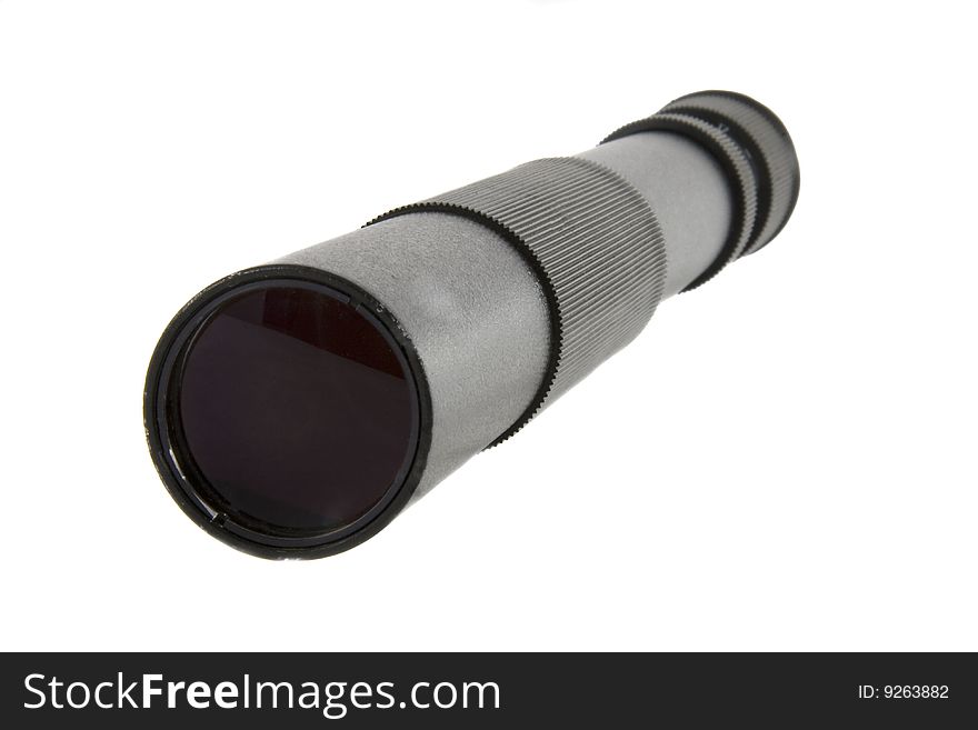 Old black spyglass isolated over white background