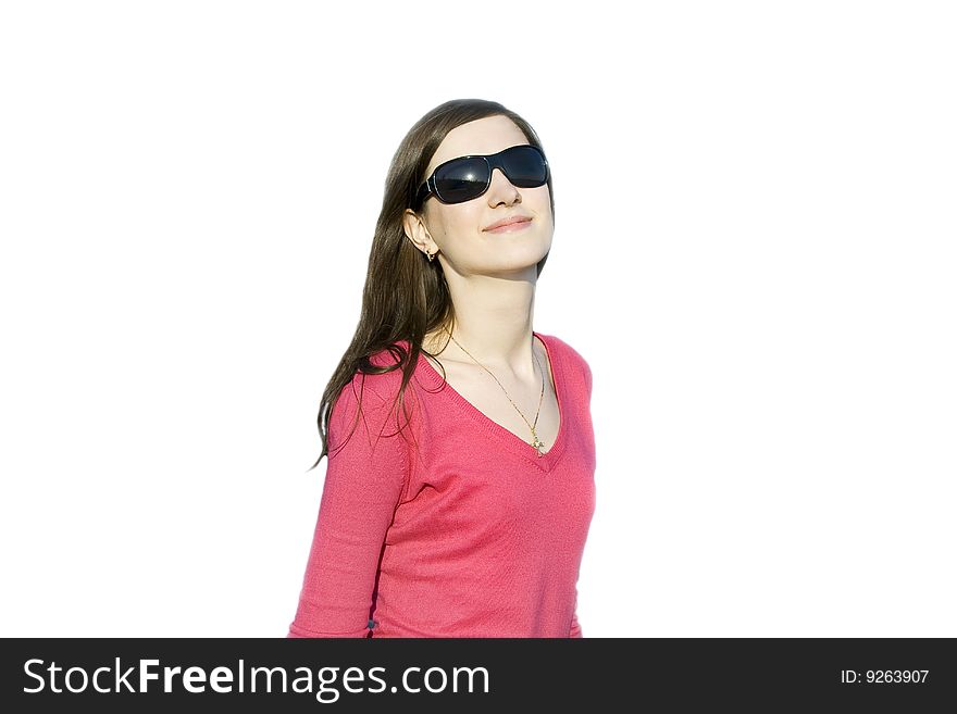 Closeup portrait of a beautiful young woman in sunglasses isolated over white