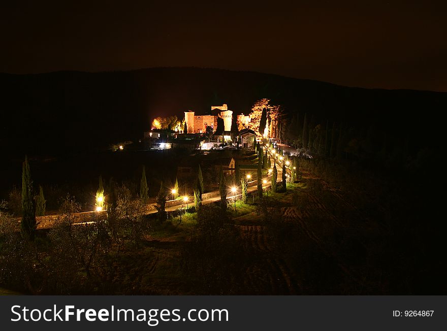 This is the Castello di Meleto in Italy / Tuscany with red wine. This is the Castello di Meleto in Italy / Tuscany with red wine