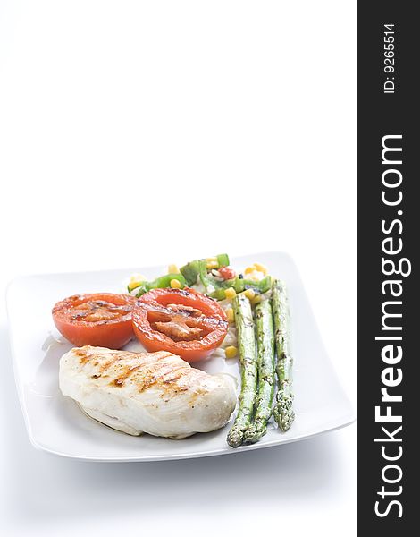 Steak barbecued chicken with vegetables isolated ove white