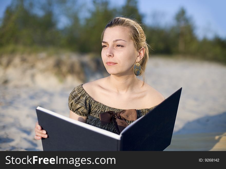 Girl with blue book