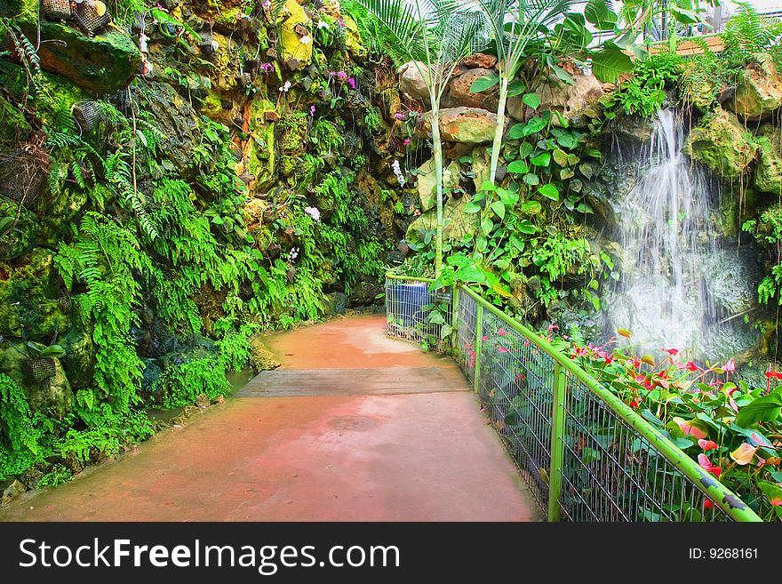 Botanic garden, waterfall and artificial lake. Botanic garden, waterfall and artificial lake.