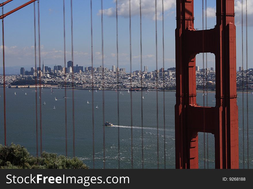 USA, San Francisco- Golden Gate Bridge CU with view of City. USA, San Francisco- Golden Gate Bridge CU with view of City