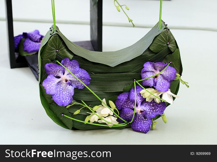 Small handbag made from orchid flowers and leaves. Small handbag made from orchid flowers and leaves