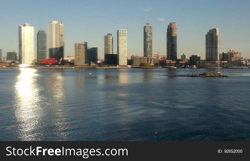 Water, Skyscraper, Sky, Building, Tower block, Tower