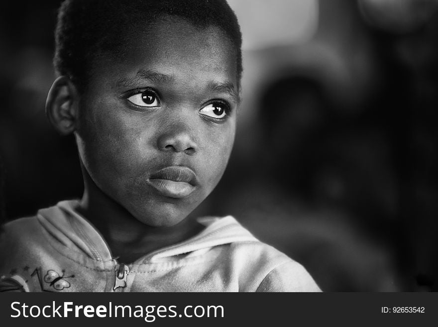 A portrait of a young black boy.