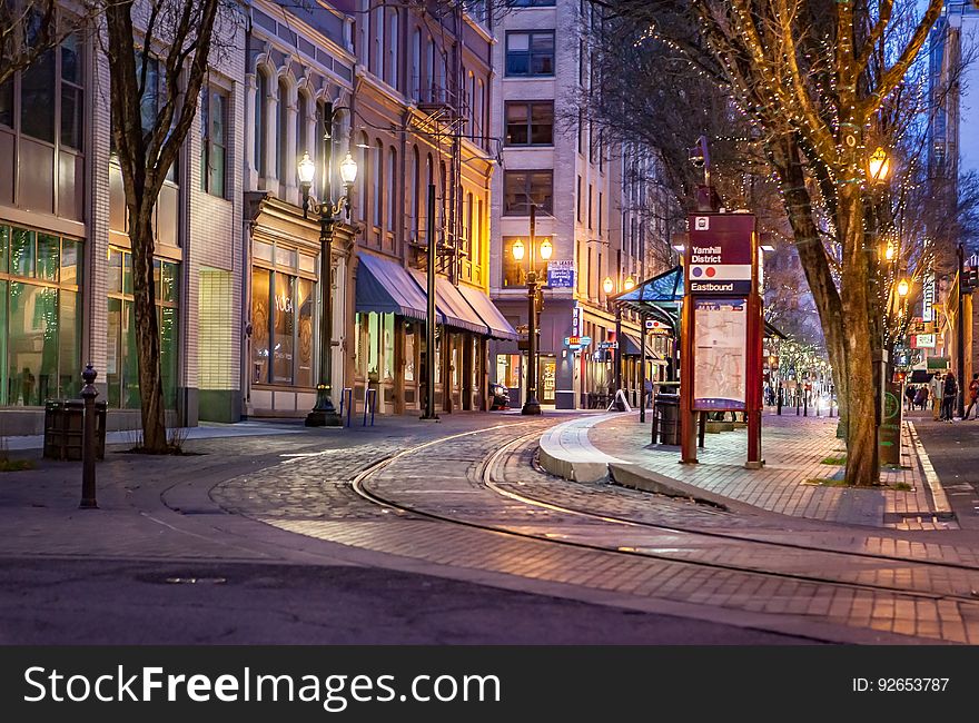 A night street with a transit platform. A night street with a transit platform.