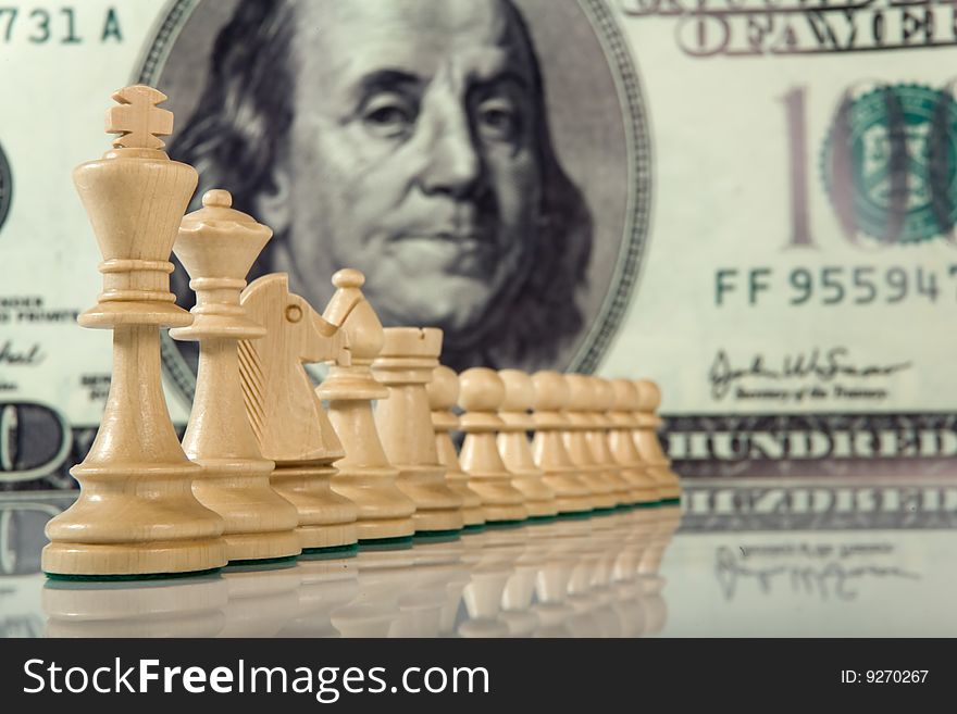 Chess composition on dollar background